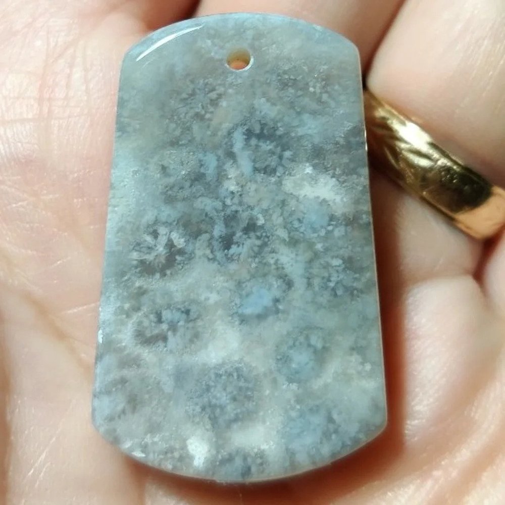 Fossilized coral pendant C334 with handmade rope